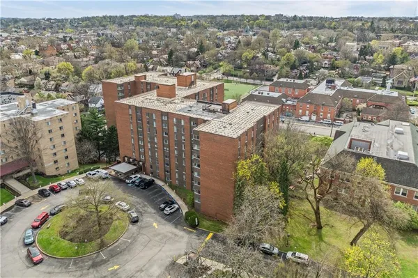 an aerial view of residential house with outdoor space