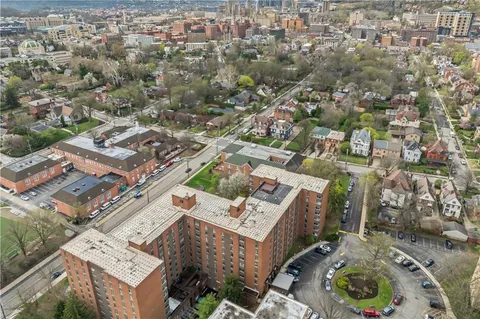 an aerial view of a city with lots of residential buildings