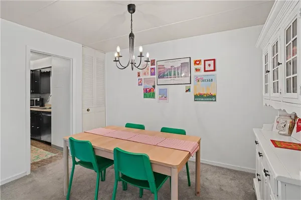 a view of a dining room with furniture