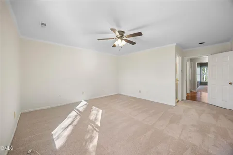 a view of a big room with carpet