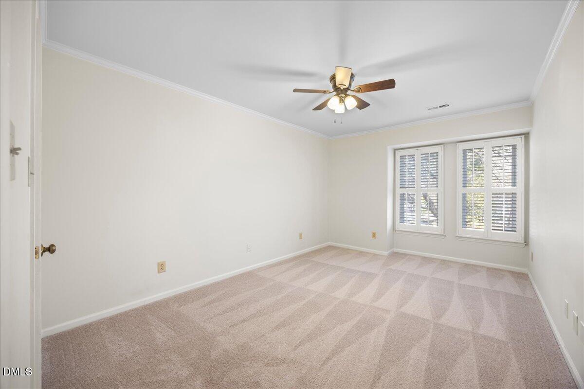 1511 Hemphill Drive Raleigh, NC 27609 - Photo 20 of 37 a view of an empty room with a window
