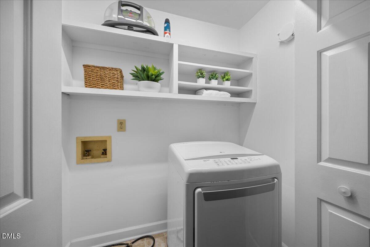 1511 Hemphill Drive Raleigh, NC 27609 - Photo 23 of 37 a utility room with sink dryer and washer