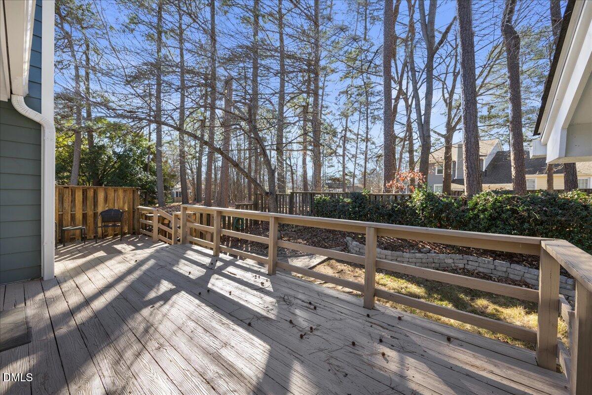 1511 Hemphill Drive Raleigh, NC 27609 - Photo 24 of 37 a view of balcony with wooden floor and fence