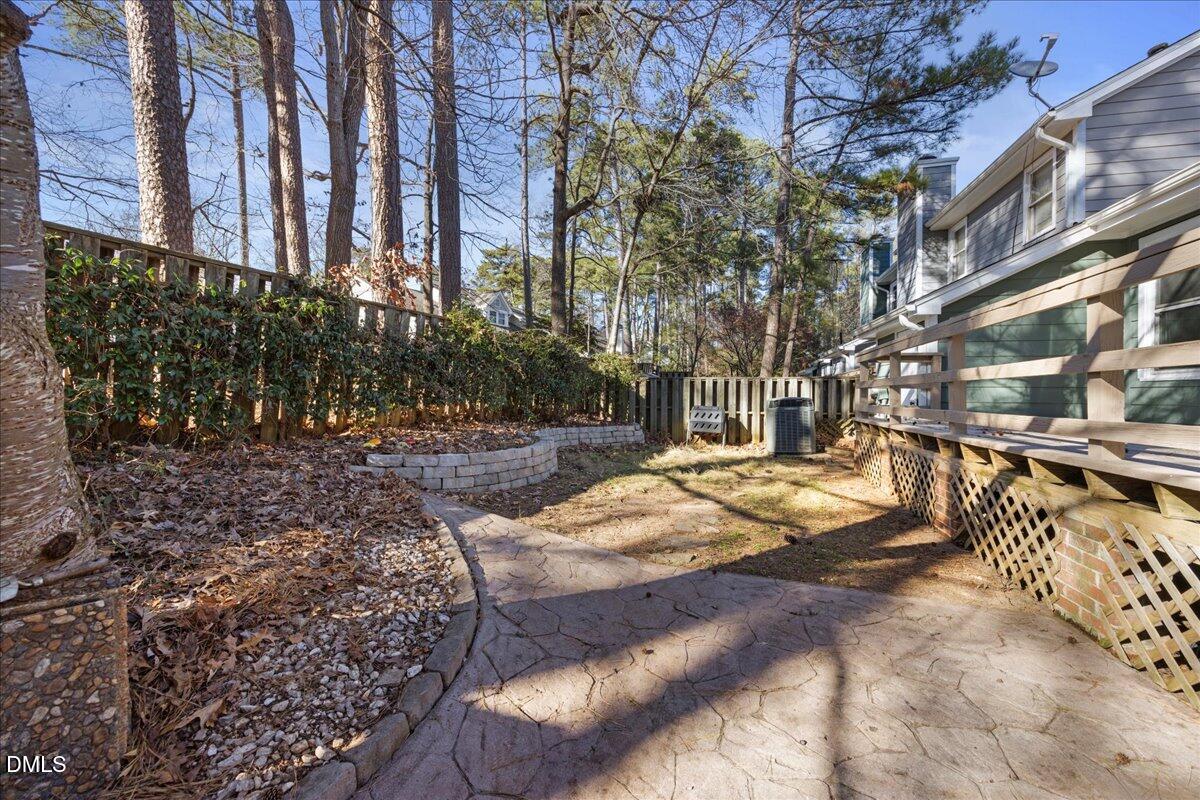 1511 Hemphill Drive Raleigh, NC 27609 - Photo 27 of 37 a view of a yard with large trees