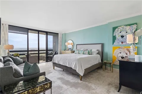 a bathroom with a double vanity sink mirror and bathtub