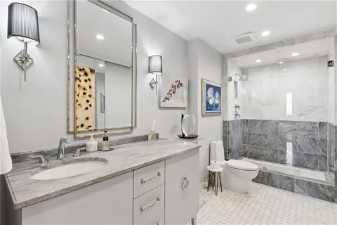 a view of a living room and a large window