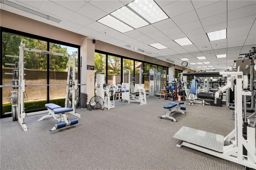 2660 Peachtree Road Northwest, Unit 34F Atlanta, GA 30305 - Photo 45 of 58 a view of a room with gym equipment