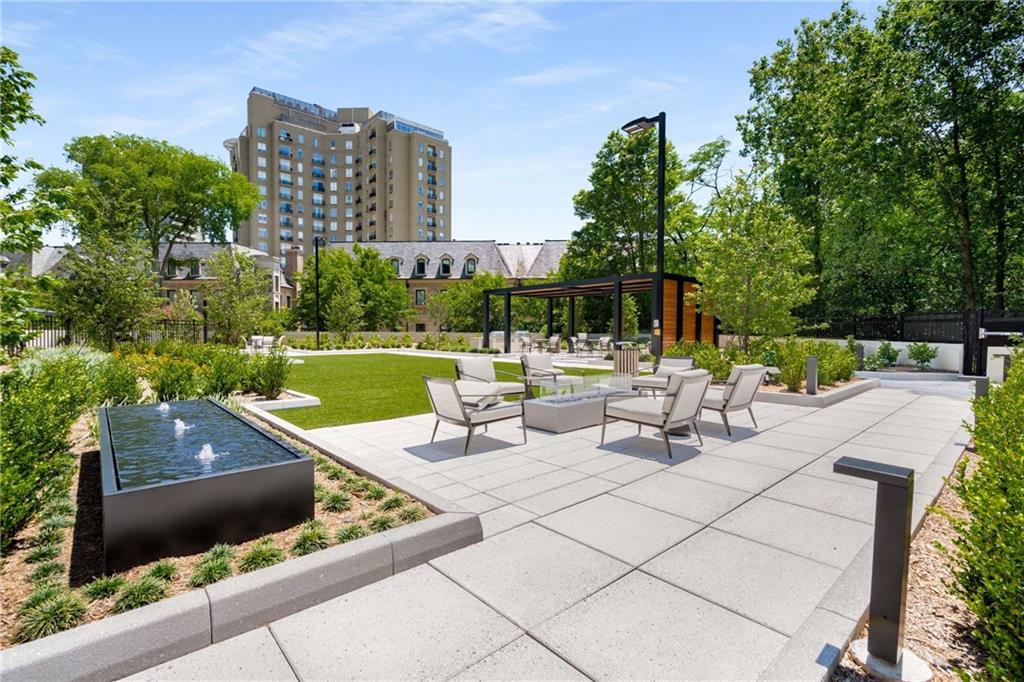 2660 Peachtree Road Northwest, Unit 34F Atlanta, GA 30305 - Photo 53 of 58 a view of a terrace with chairs