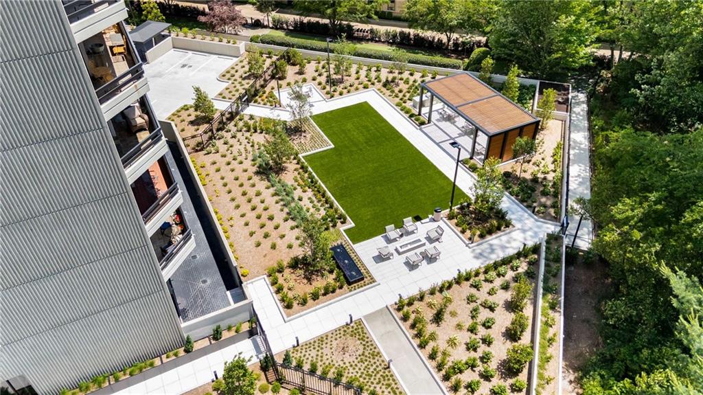 2660 Peachtree Road Northwest, Unit 34F Atlanta, GA 30305 - Photo 56 of 58 an aerial view of a house with a yard