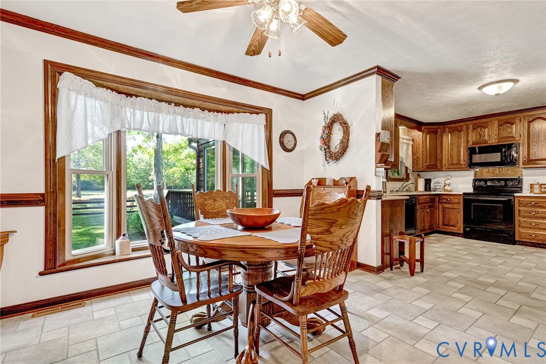 11516 Doswell Road Doswell, VA 23047 - Photo 12 of 50 a view of a dining room with furniture window and outside view