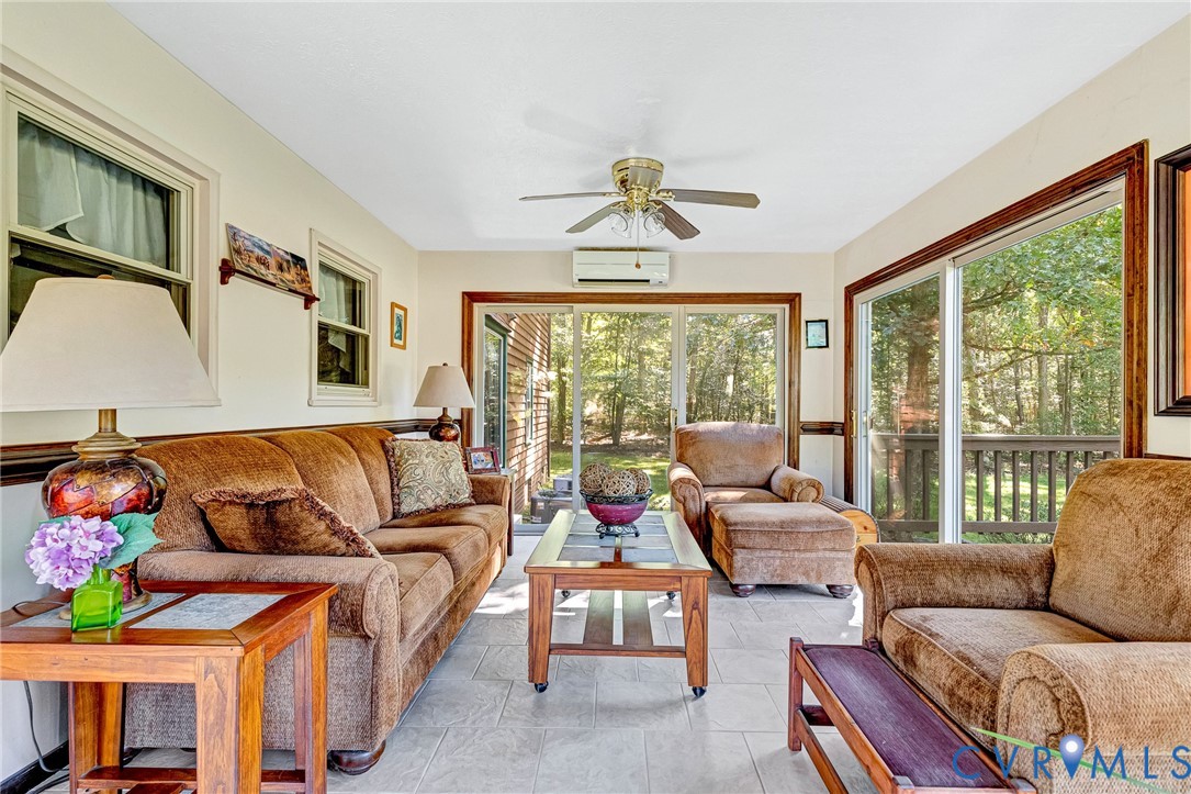 11516 Doswell Road Doswell, VA 23047 - Photo 15 of 50 a living room with furniture and a large window