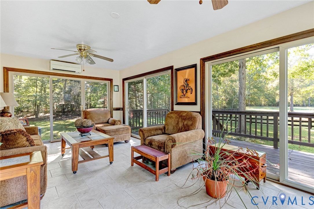 11516 Doswell Road Doswell, VA 23047 - Photo 16 of 50 a living room with furniture and a large window