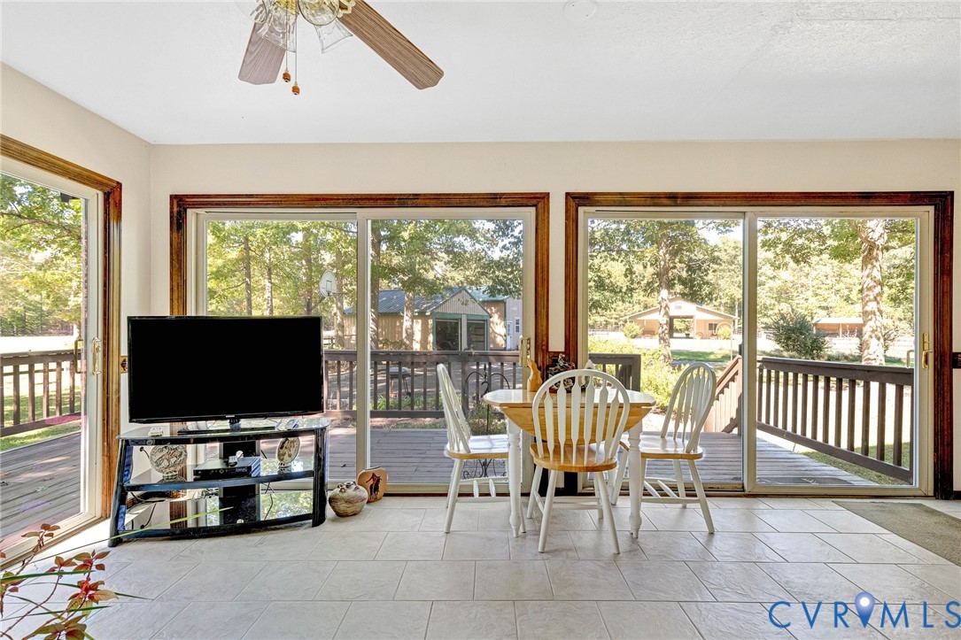 11516 Doswell Road Doswell, VA 23047 - Photo 17 of 50 a living room with furniture and a flat screen tv