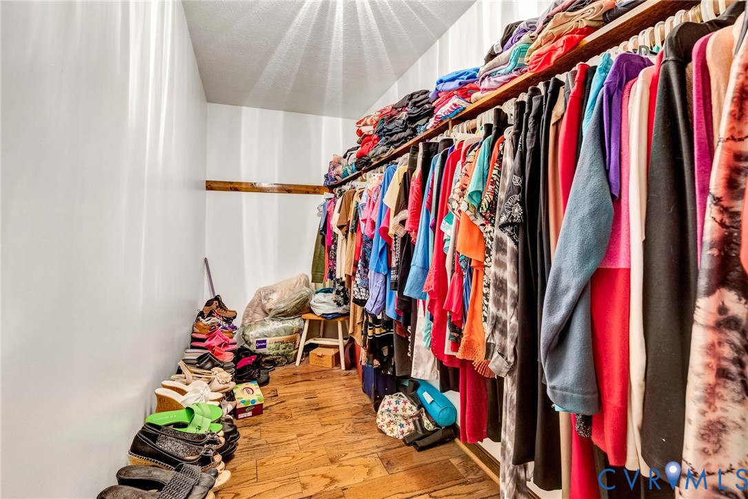 11516 Doswell Road Doswell, VA 23047 - Photo 27 of 50 a view of walk in closet with clothes