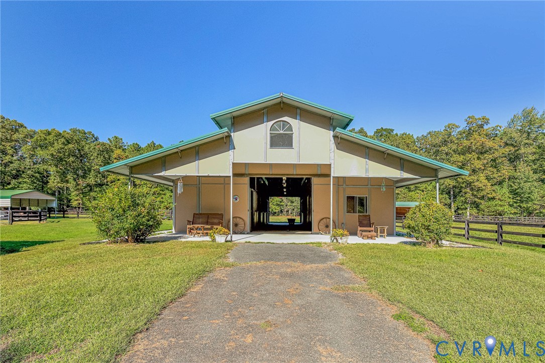 11516 Doswell Road Doswell, VA 23047 - Photo 32 of 50 a front view of a house with a yard and garage
