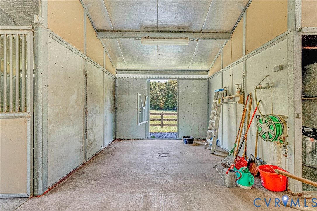 11516 Doswell Road Doswell, VA 23047 - Photo 36 of 50 a view of an entryway with a flower pot and floor to ceiling window