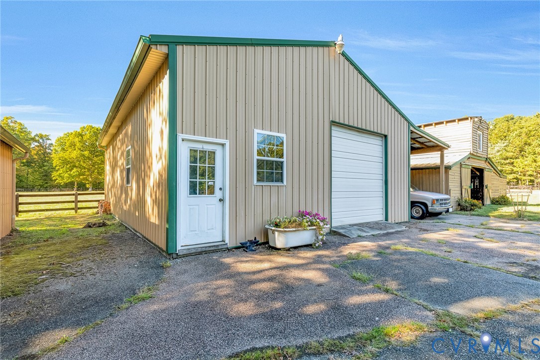 11516 Doswell Road Doswell, VA 23047 - Photo 41 of 50 a view of a house with backyard and sitting area