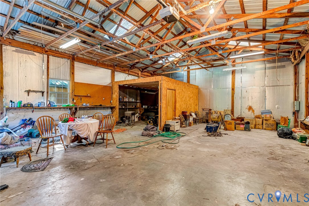 11516 Doswell Road Doswell, VA 23047 - Photo 42 of 50 a view of a room with gym equipment and floor to ceiling window