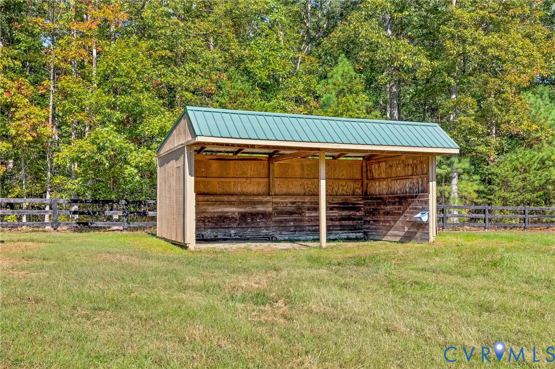 11516 Doswell Road Doswell, VA 23047 - Photo 44 of 50 a view of a house with a yard and garage
