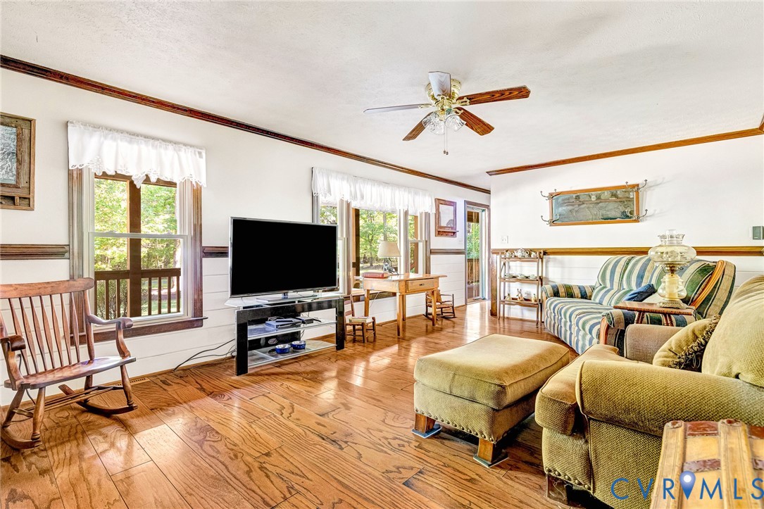 11516 Doswell Road Doswell, VA 23047 - Photo 7 of 50 a living room with furniture and a flat screen tv