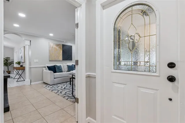 a view of a livingroom with furniture and a window