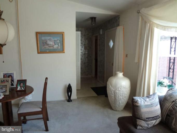 4740 Byron Road Baltimore, MD 21244 - Photo 6 of 12 a workspace with furniture and a window