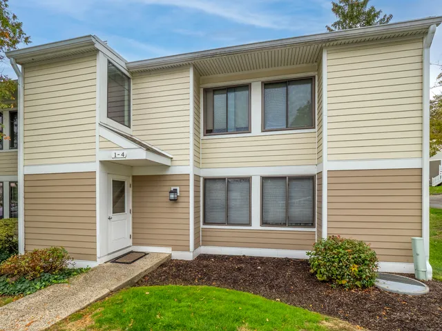 a view of backyard of a house