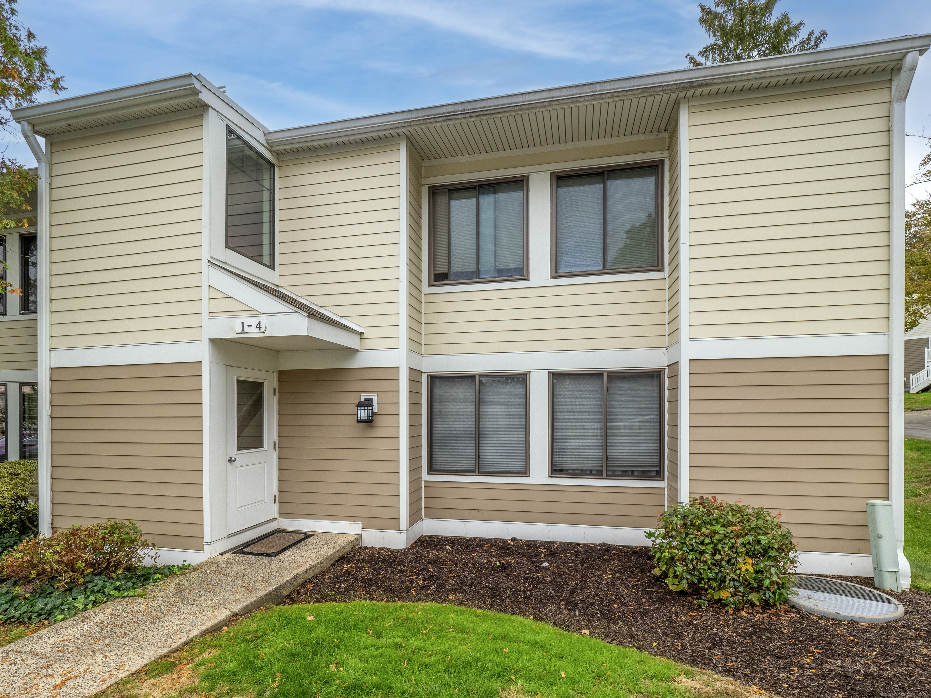 a view of backyard of a house