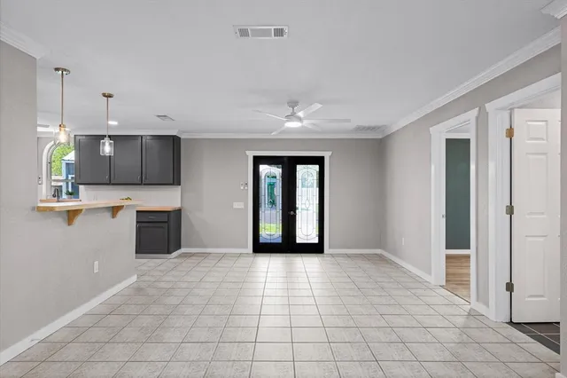 a view of a kitchen with a sink and a stove top oven