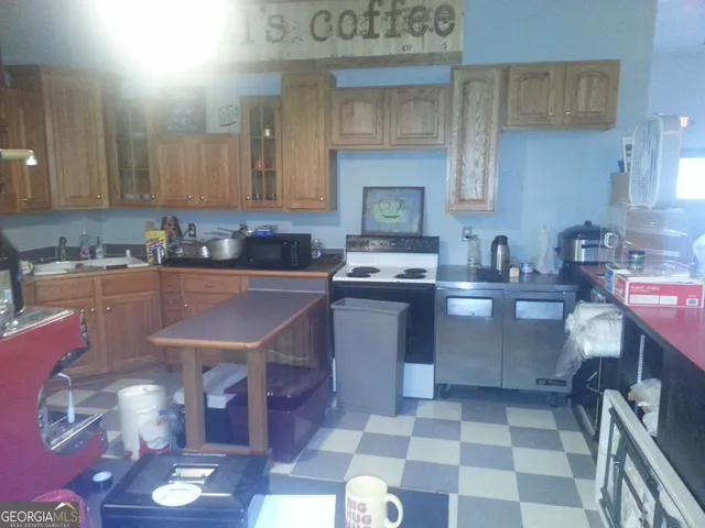 a view of a hallway with seating area