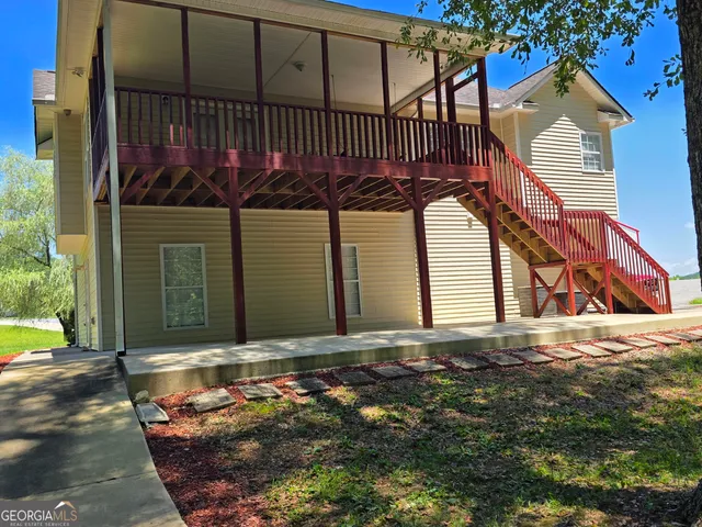 a view of storage and utility room with wooden floor