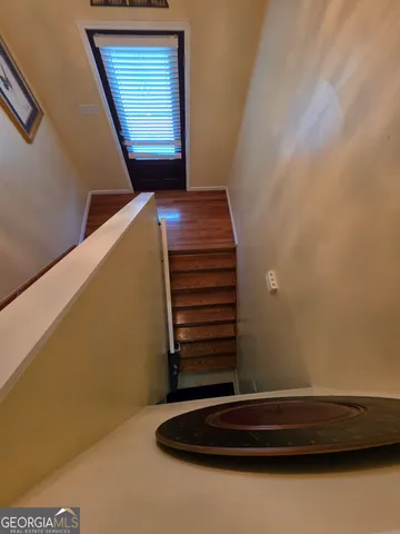 a aerial view of a house with a yard