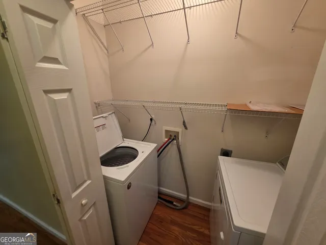 a view of a room with a fireplace