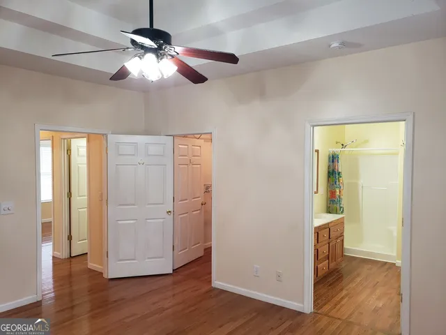 a bathroom with a bathtub and a sink