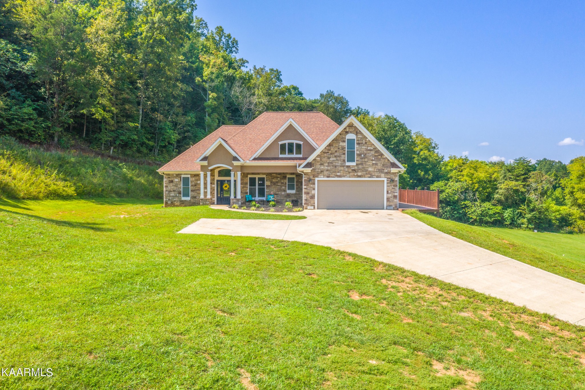 1335 Deep Springs Road Dandridge, TN 37725 - Photo 1 of 30 a house with swimming pool in front of it
