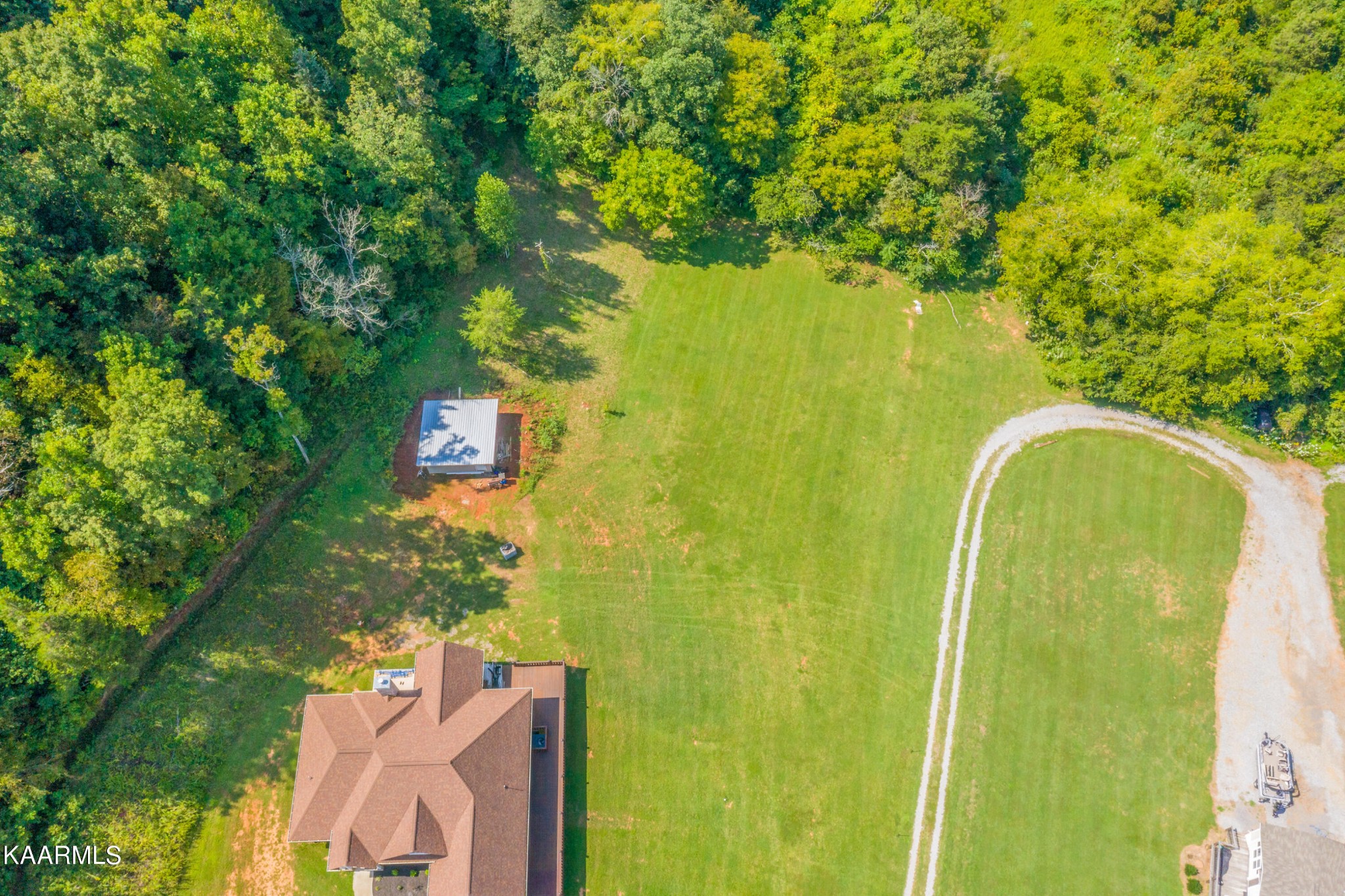 1335 Deep Springs Road Dandridge, TN 37725 - Photo 12 of 30 a view of a yard with plants