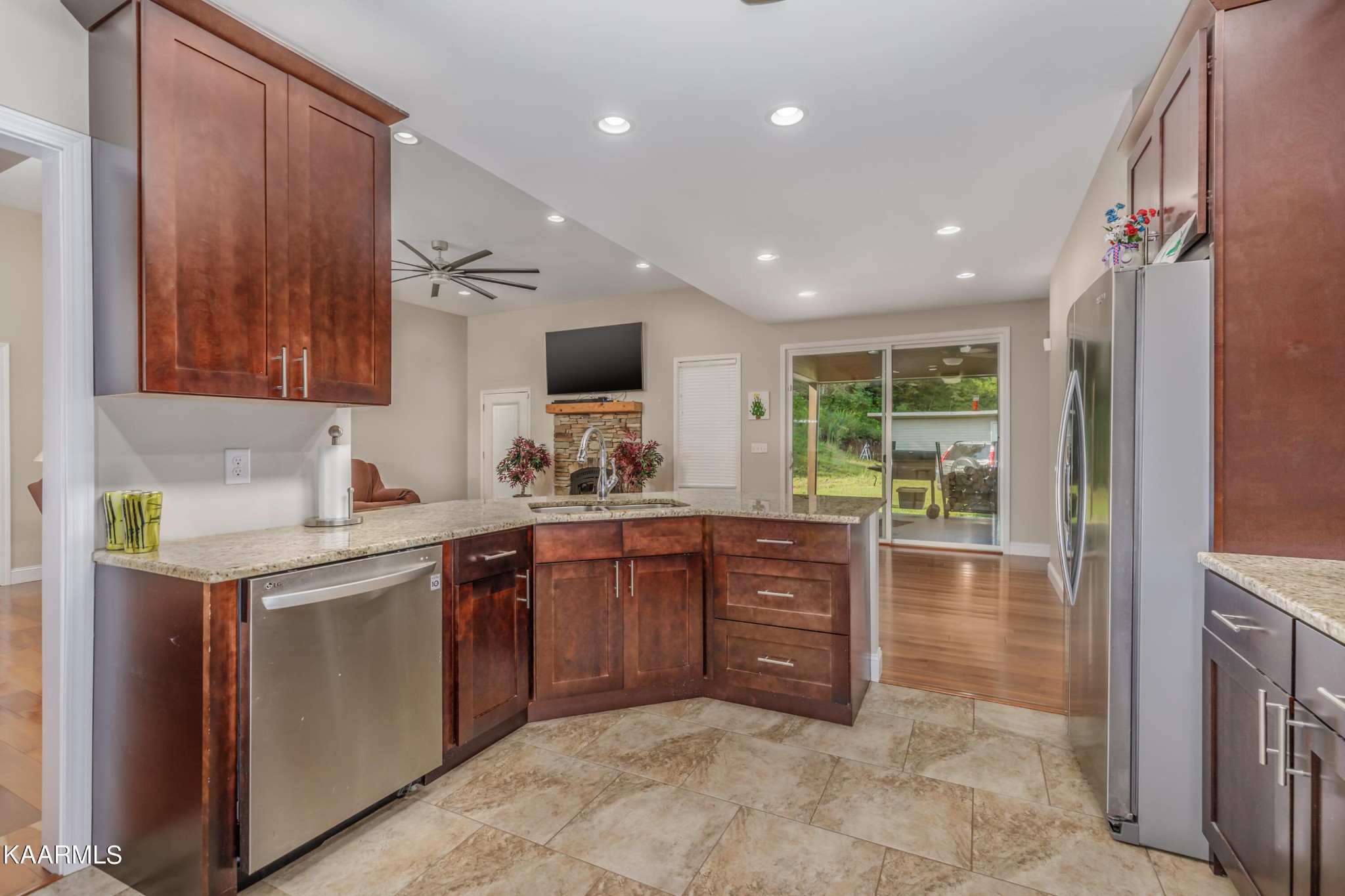 1335 Deep Springs Road Dandridge, TN 37725 - Photo 19 of 30 a kitchen with sink and wooden cabinets