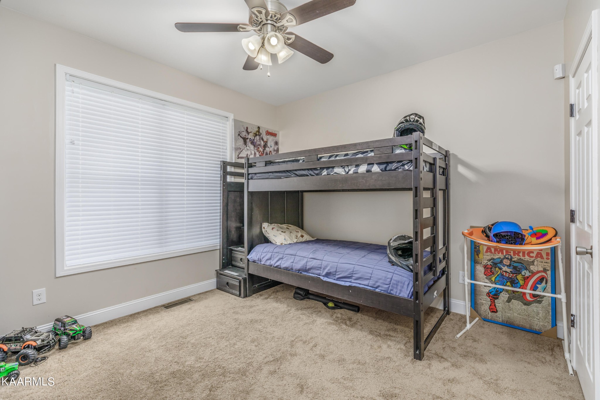 1335 Deep Springs Road Dandridge, TN 37725 - Photo 25 of 30 a bedroom with a bed and a window