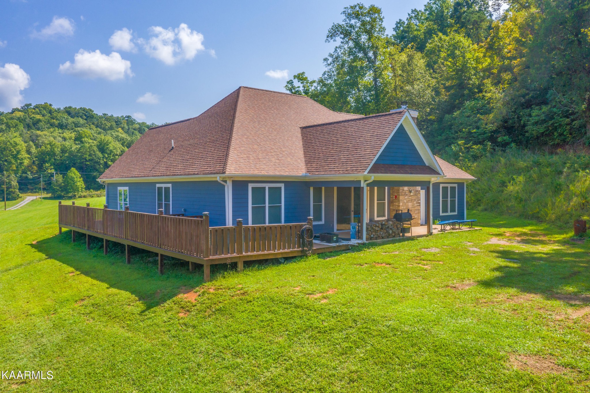 1335 Deep Springs Road Dandridge, TN 37725 - Photo 5 of 30 a front view of a house with yard and green space