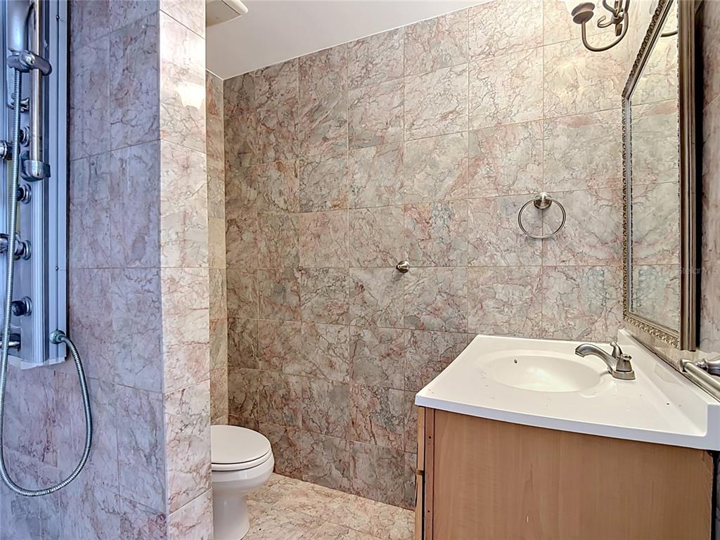 7925 Lake Mabel Loop Road Lake Wales, FL 33898 - Photo 61 of 97 a bathroom with a sink toilet and shower