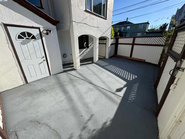 a view of a livingroom with furniture and staircase