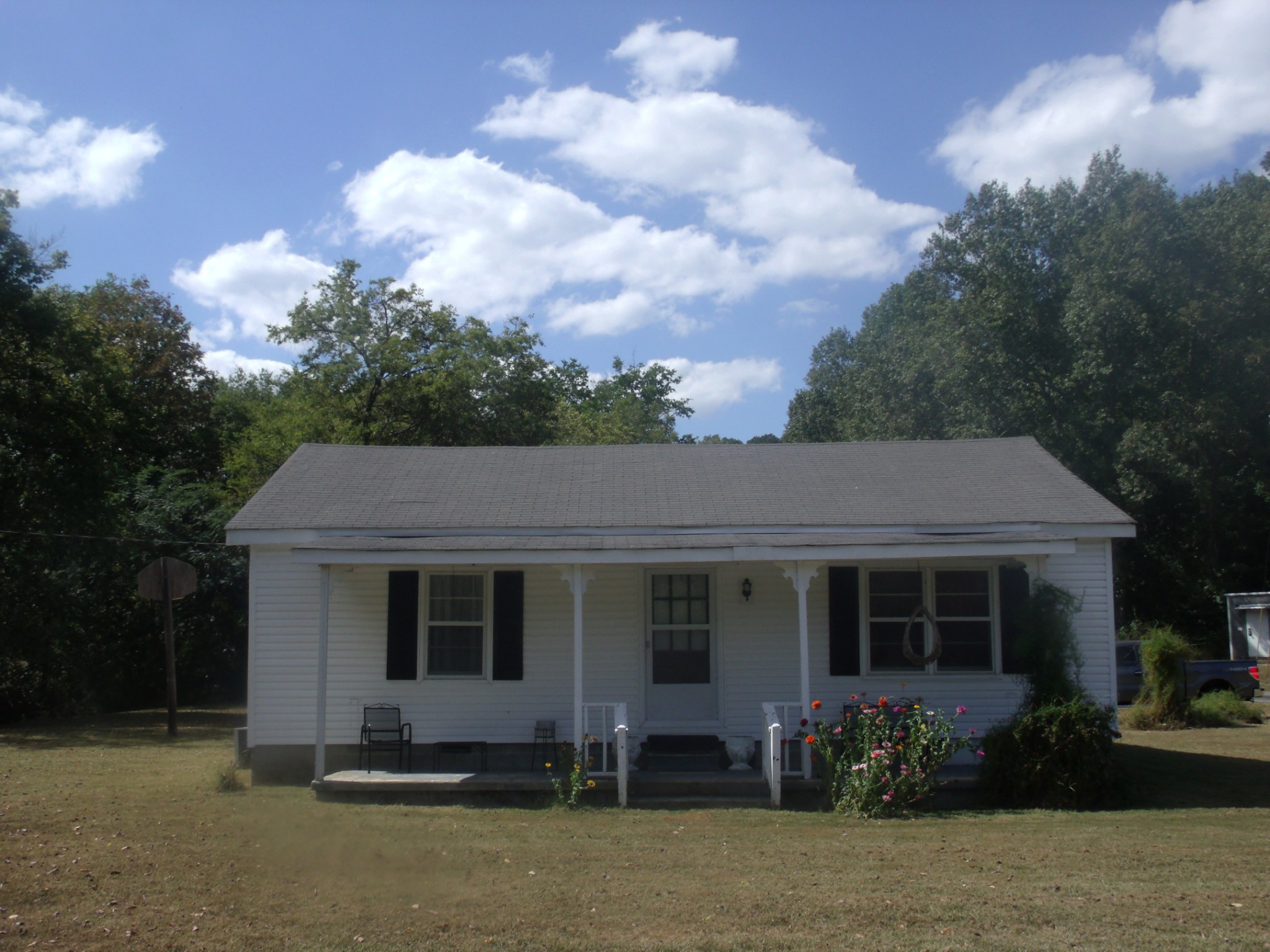 1310 Bevels Spring Road Goodspring, TN 38460 - Photo 14 of 30 a front view of a house with garden