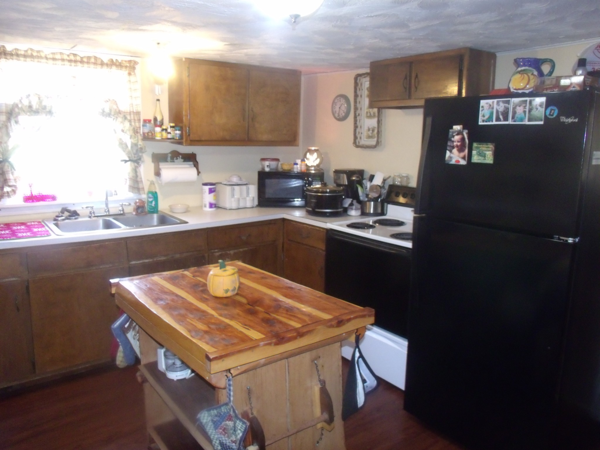 1310 Bevels Spring Road Goodspring, TN 38460 - Photo 17 of 30 a kitchen with a sink a counter space and appliances