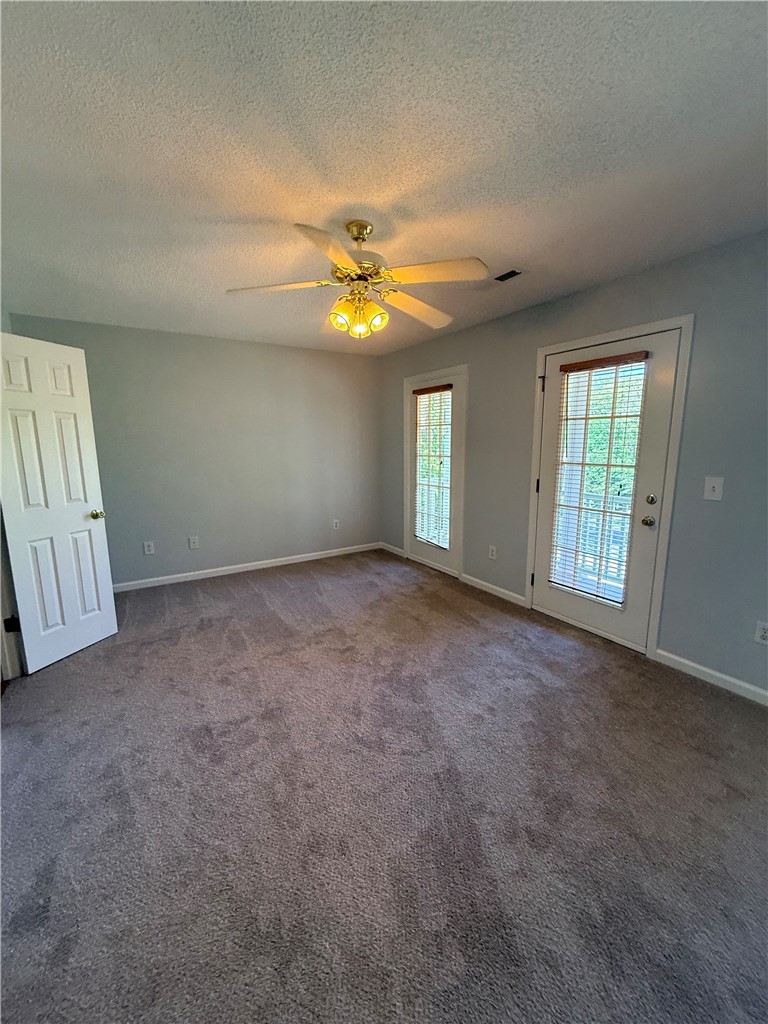 613 Brock Street Central, SC 29630 - Photo 13 of 28 This spacious room features ample natural light and direct outdoor access.
