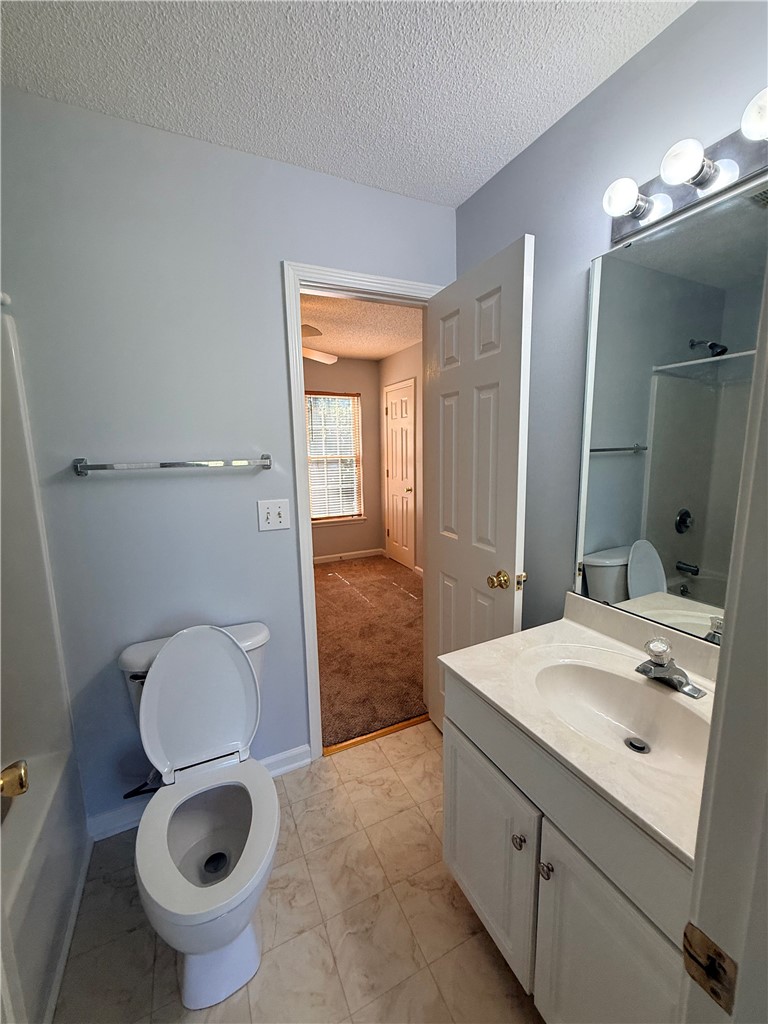 613 Brock Street Central, SC 29630 - Photo 20 of 28 This bathroom features a functional layout with easy access to an adjacent room.