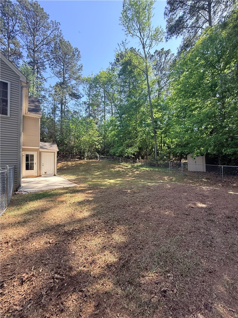 613 Brock Street Central, SC 29630 - Photo 26 of 28 Expansive backyard with mature trees, perfect for outdoor activities and relaxation.