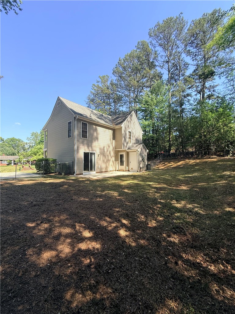 613 Brock Street Central, SC 29630 - Photo 27 of 28 This residence features a spacious yard and convenient patio access, ideal for outdoor enjoyment.