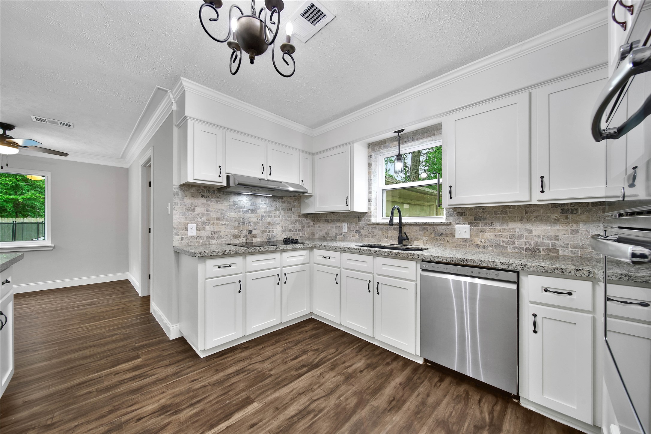6407 Craigway Road Spring, TX 77389 - Photo 7 of 47 Check out the updated kitchen with granite counters, a single-bowl sink, and stainless steel appliances.