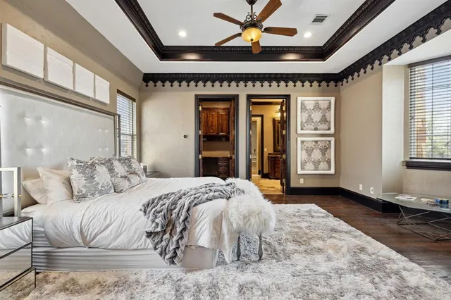 an aerial view of a house with a lake view