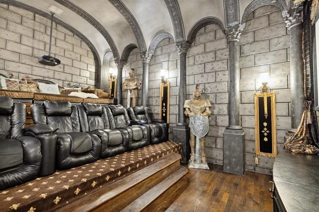 a view of a house with sitting area and garden